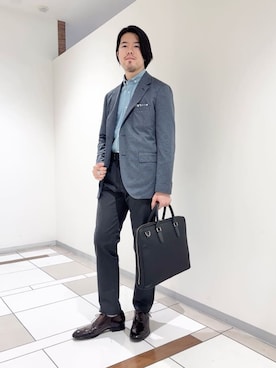 「アイテム（ビジネスバッグ）」を使った、及川さん（メンズ・170cm）の冬コーディネート