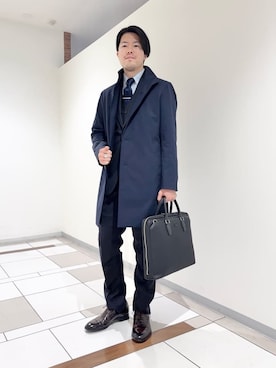 「アイテム（ビジネスバッグ）」を使った、及川さん（メンズ・170cm）の冬コーディネート