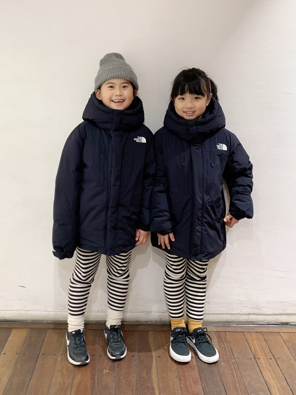 「私の推しブランド、バルトロライトジャケット、THE NORTH FACE、ボーダー、レギンス、ニット帽、NIKE、AIR MAX、スニーカー、スニーカーコーデ、モノトーン、リンクコーデ、リュック、あったかコーデ、ダウンジャケット」｜「THE NORTH FACEの【WEB限定】THE NORTH FACE/ザ ノース フェイス  Endurance Baltro Jacket（ダウンジャケット/コート、ブラック系）」を使った、bow-changさん（キッズ・120cm）の冬コーディネートの1枚目の写真