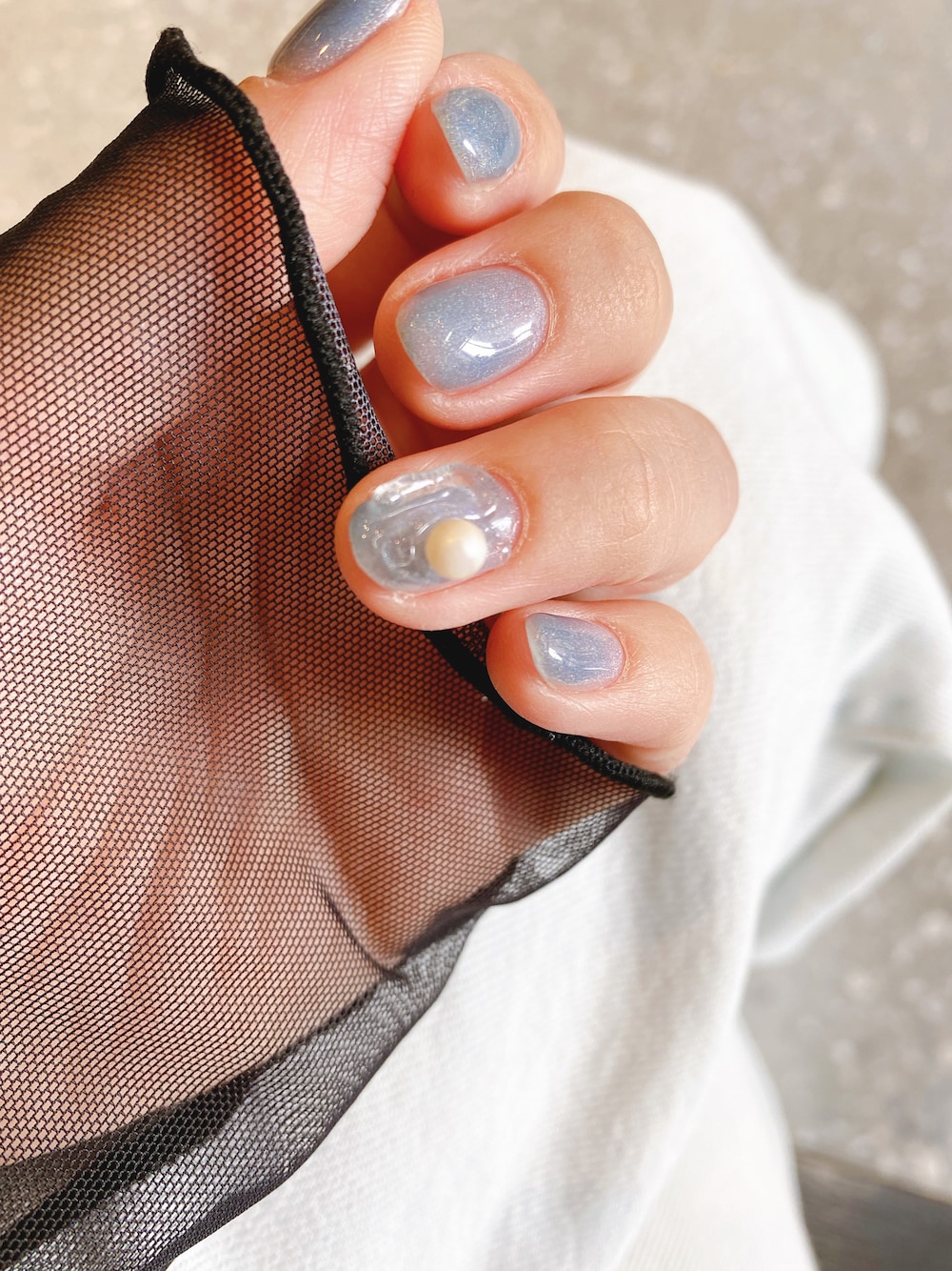 ブルー系のその他を着用したレディースの春コーディネートの1枚目の写真