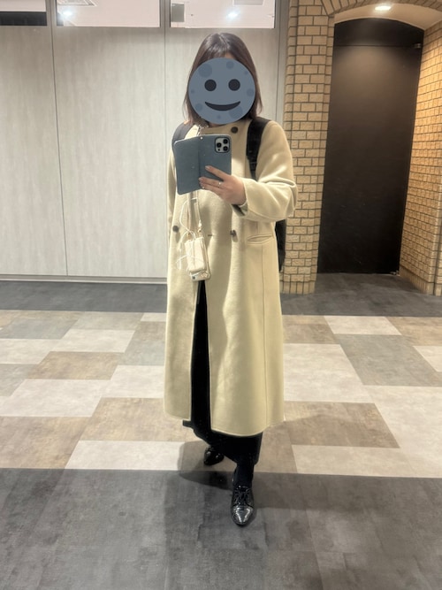 martinique（マルティニーク）の「ノーカラーロングコート