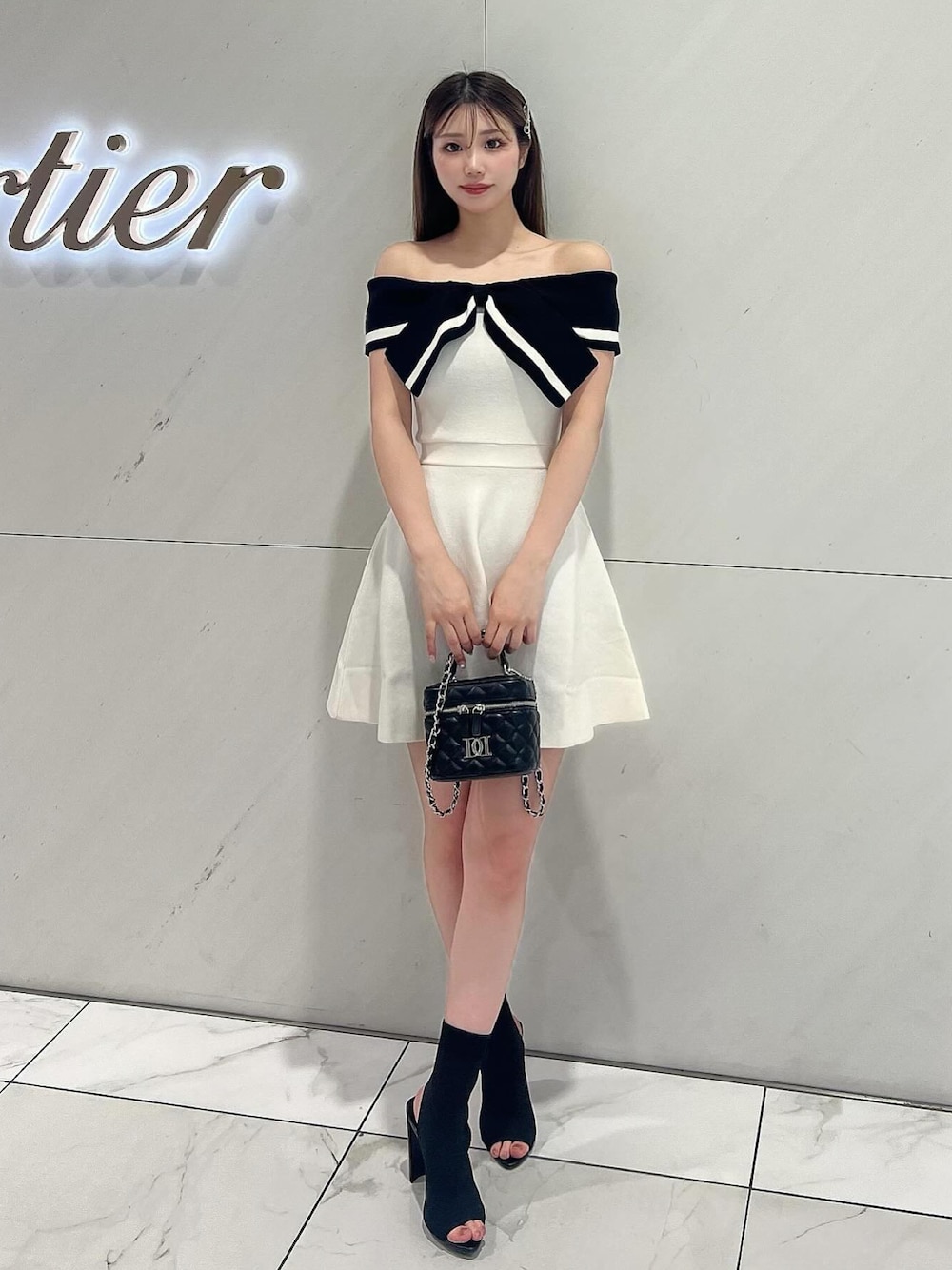 Darich（ダーリッチ）の「ビッグリボンオフショルニットミニ