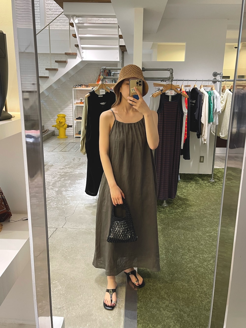 「夏コーデ、さらっと晴れやかスナップ、サンダル、キャミワンピ、今日のコーデ、バケットハット、お出かけコーデ、カジュアルガーリー、ワンピース、麦わら帽子、リゾートスタイル、outfit、いいね、save、フォローお願いします🤑、ラクチンコーデ」｜「CANAL JEANのEl mar(エルマール) バックリボンキャミワンピース（ワンピース、グリーン系）」を使った、nanohaさん（レディース・164cm）の夏コーディネートの1枚目の写真