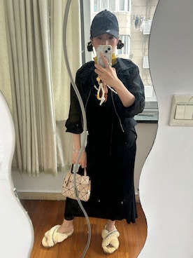 「ISSEY MIYAKE（イッセイミヤケ）のアイテム（スカート、ブラック系）」を使った、yoyoさん（レディース・168cm）の春コーディネート