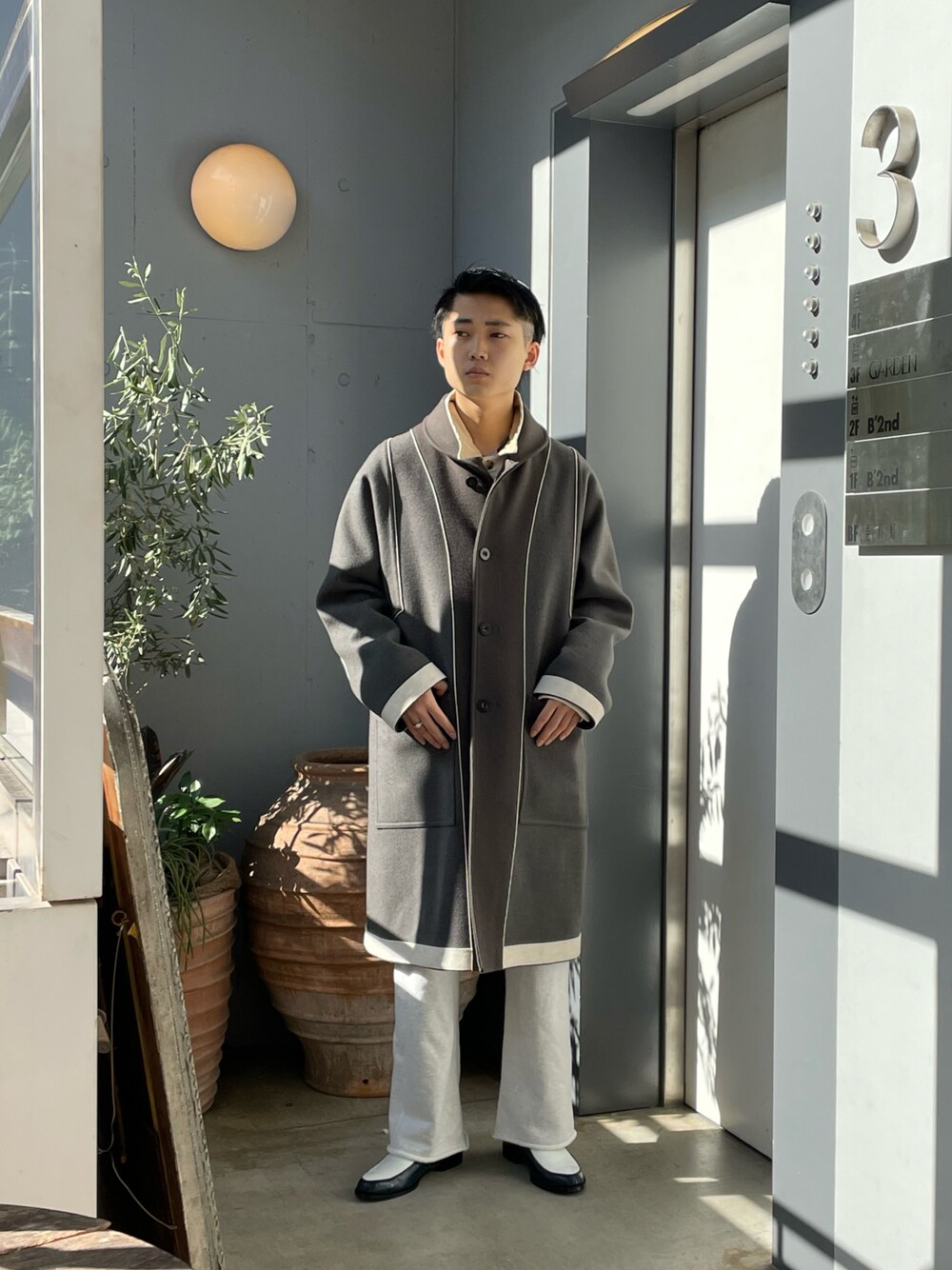 「GARDEN TOKYO、IRENISA、TOIRONIER、bowwow」｜「ToironierのToironier/トワロニエ/Half Zip Knit（ニット/セーター、シルバー系）」を使った、野口心さん（メンズ・175cm）の冬コーディネートの1枚目の写真