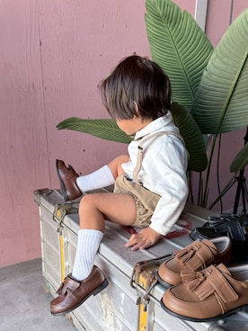 「Fluffy BROTHERS（フラッフィーブラザーズ）のベビーロンパース（ロンパース、ベージュ系）」を使った、fluffybrothersさん（キッズ・120cm）の冬コーディネート