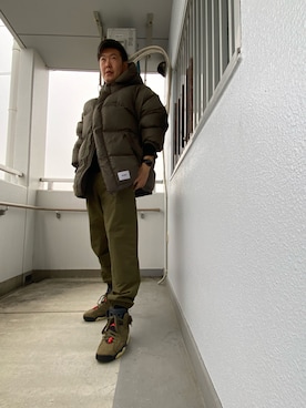 「WTAPS（ダブルタップス）のアイテム（ダウンジャケット/コート）」を使った、en  and outdoor unitさん（メンズ・182cm）の冬コーディネート