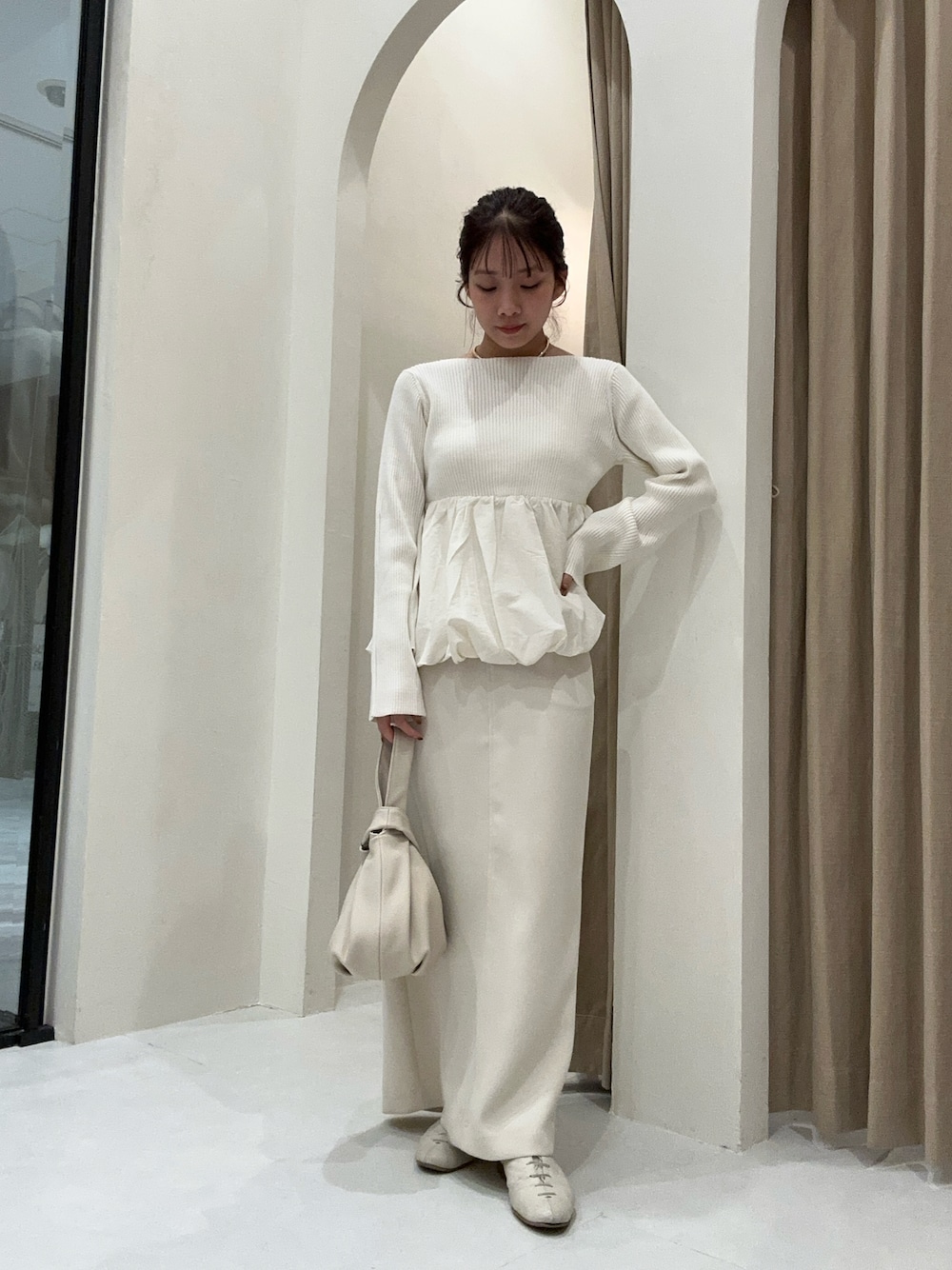 ニットドッキングバルーンチュニックを使った人気ファッション