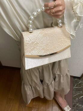 「楽天のアイテム（ショルダーバッグ、ベージュ系）」を使った、 yu :)さん（レディース）の冬コーディネート