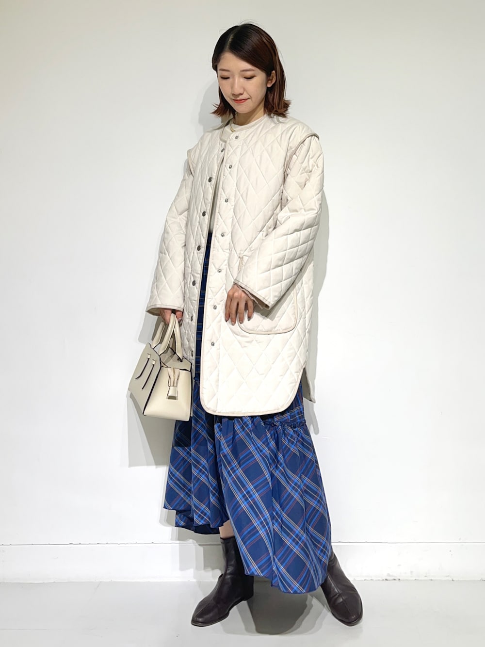 sakiさんの「『UR TECH』キルティングミドルコート（SENSE OF PLACE by URBAN RESEARCH）」を使ったコーディネートの1枚目の写真