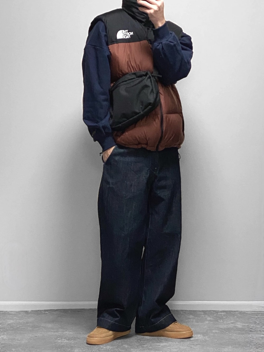 THE NORTH FACEのダウンベスト（ブラウン系）を使った人気