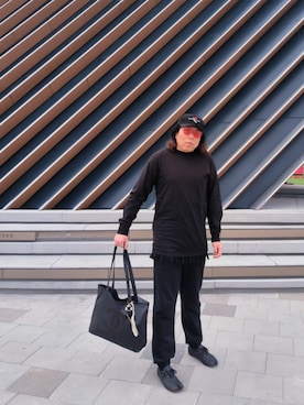 「アイテム（エコバッグ/サブバッグ）」を使った、Panda Ngさん（メンズ・180cm）の冬コーディネート