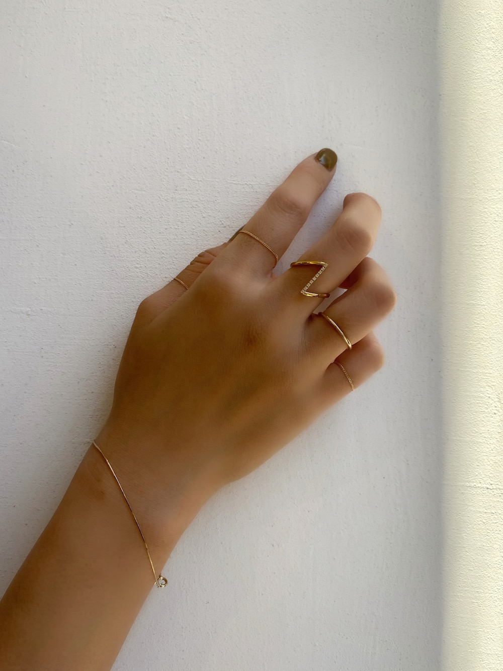 PAS TIERRA（パティエラ）の「-Ray- K10スネークチェーンブレスレット