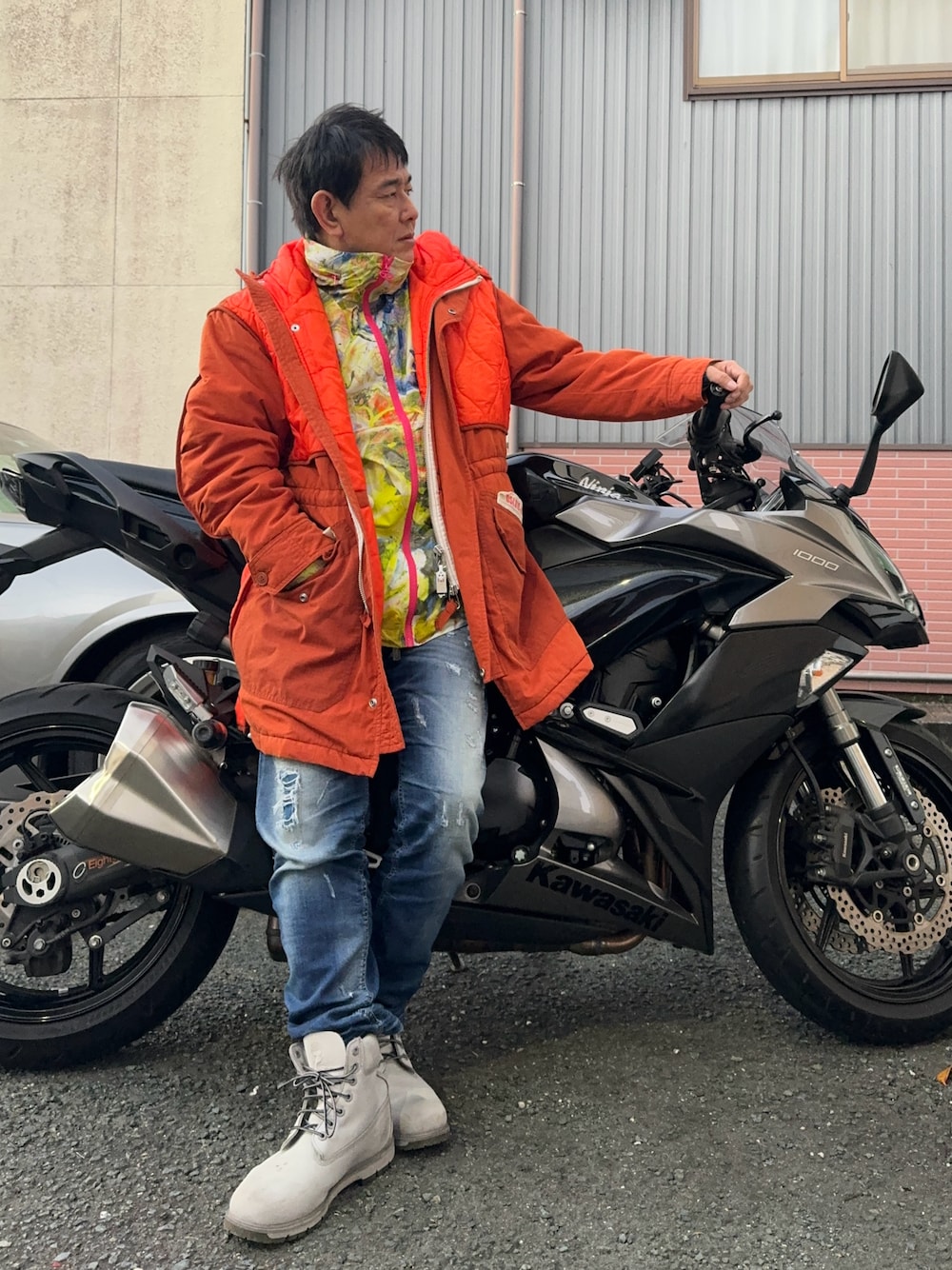 【新品同様】DIESEL オレンジ ダウンジャケット DIESEL（ディーゼル）の「レディース ショート ダウンジャケット