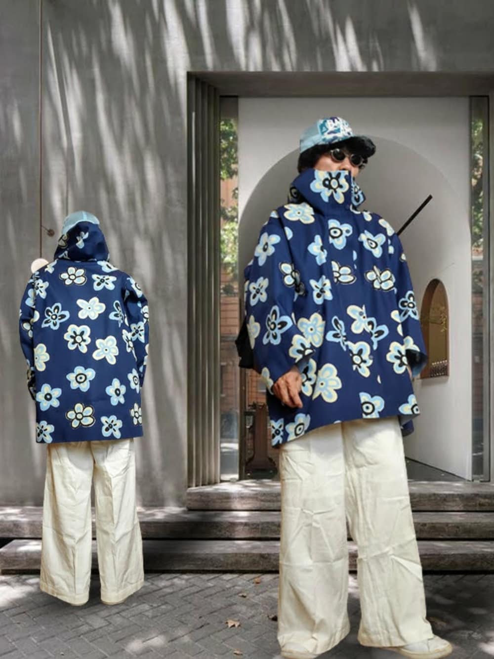 「レインコート、マウンテンパーカー、ブロックテック、花柄、フラワープリント、ワイドパンツ、白パンツ、白スニーカー、キャップ、ブルー×ホワイト、ユニクロマルニ、UNIQLOMARNI、オーバーサイズ、春夏コーデ、雨の日コーデ」｜「UNIQLO MARNIのアイテム（マウンテンパーカー、ブルー系）」を使った、msg1961さん（メンズ・170cm）の夏コーディネートの1枚目の写真