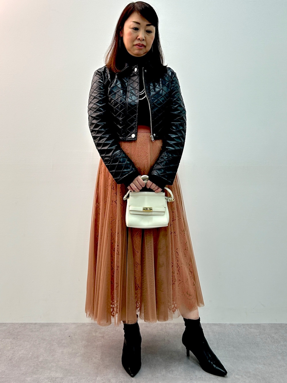 nissen（ニッセン）の「フェイクレザーキルティングショート丈