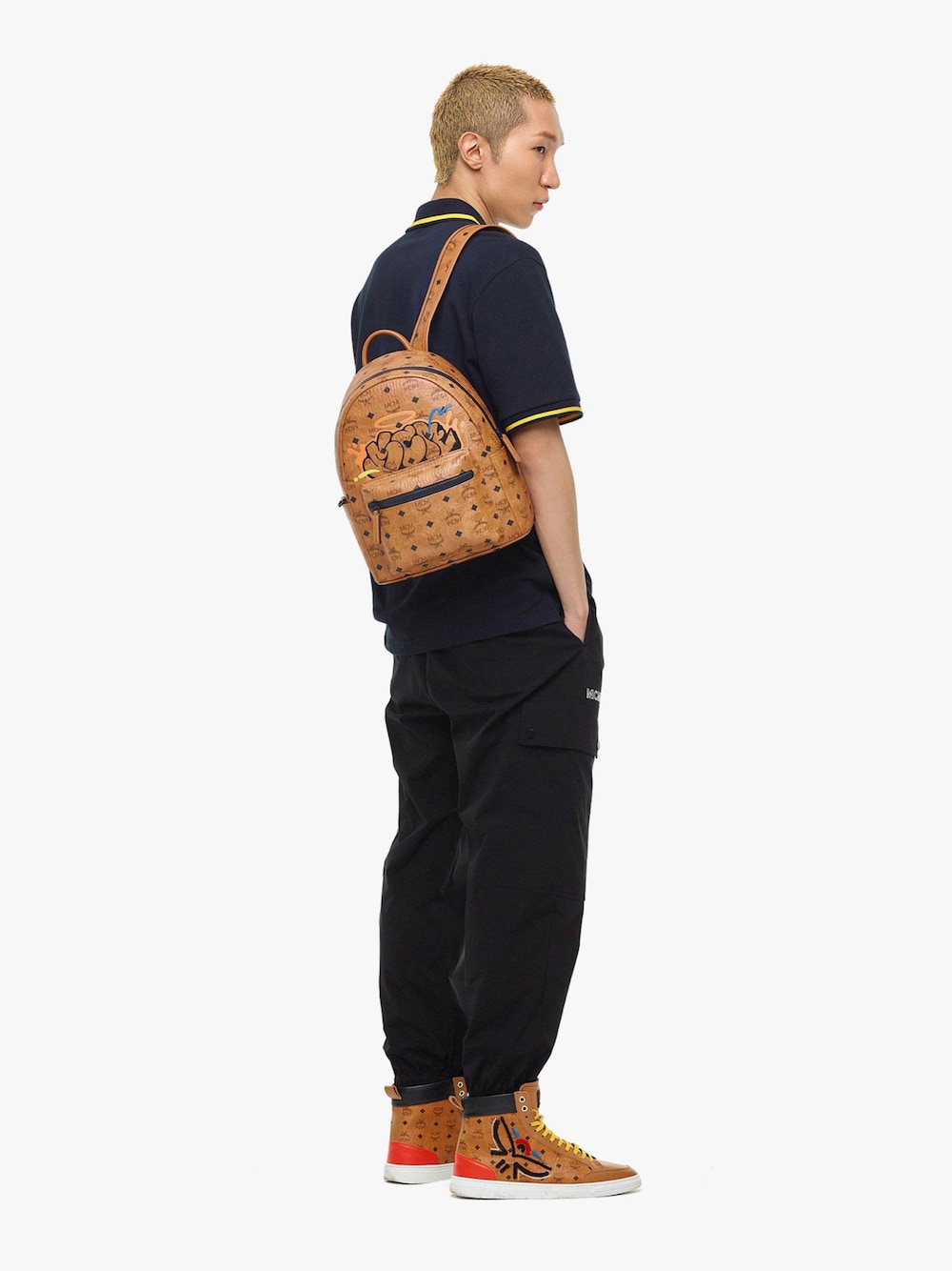 MCM ブラウン リュック バッグ チャーム付き Odd Symbol Stitch Mini Backpack | ファッション通販サイト NUGU