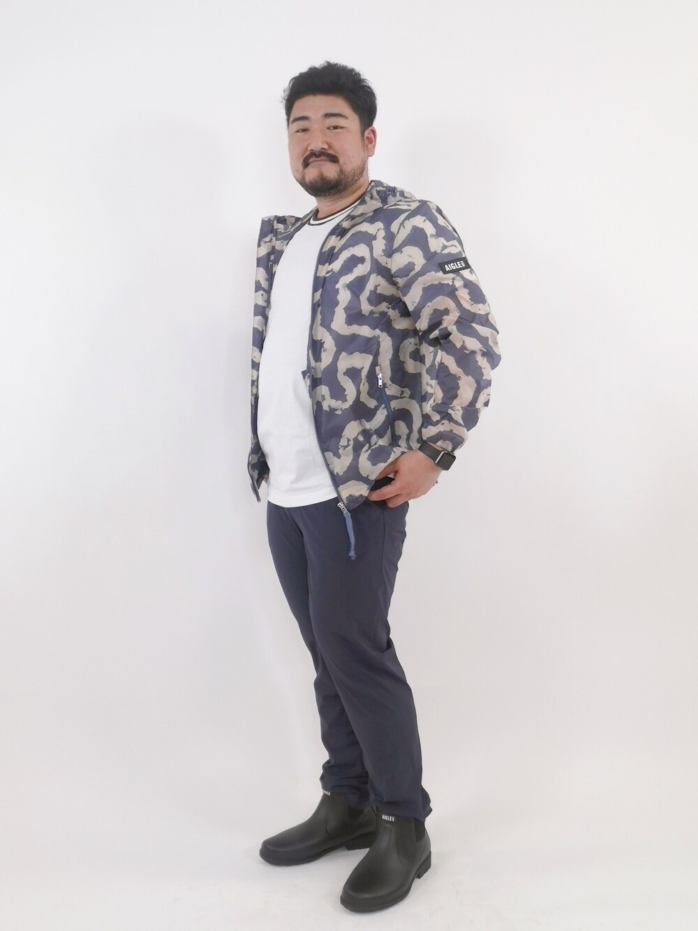 AIGLE(エーグル)の「撥水 エクストラライトプリントフーデッド