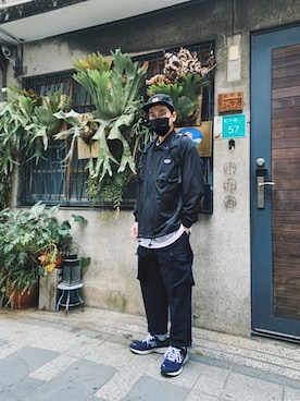 「carhartt」｜「アイテム（マウンテンパーカー）」を使った、阿展さん（メンズ・175cm）の冬コーディネート
