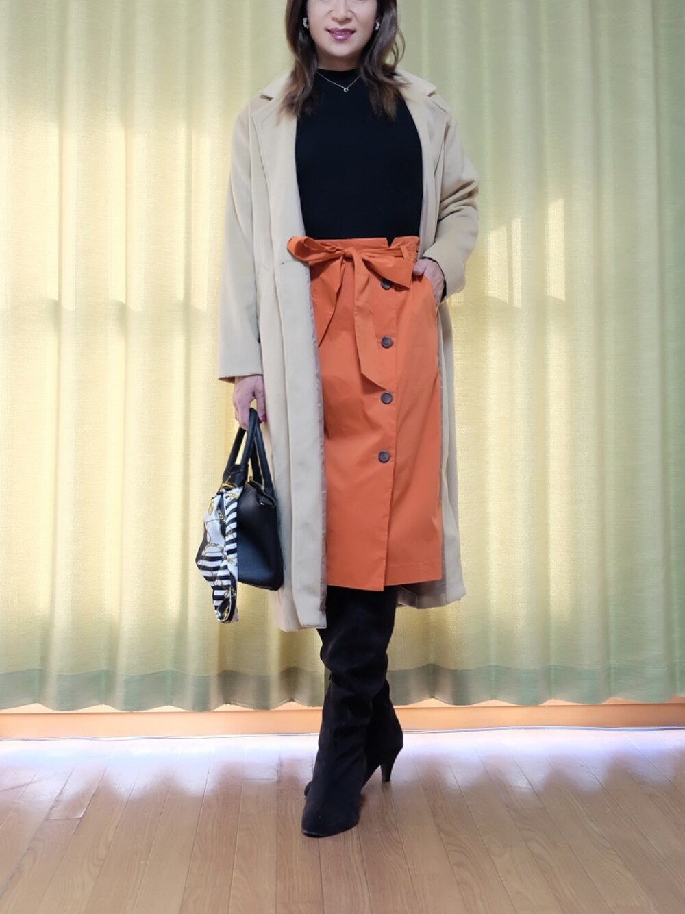 「オトナ女子、ハイネック、ニット、ロングブーツ、オレンジ🍊、フェイクボタン、ウエストリボン🎀、チェスターコート」｜「CLEARIMPRESSION のアイテム（スカート、オレンジ系）」を使った、Kanon1008さん（レディース・170cm）の冬コーディネートの1枚目の写真