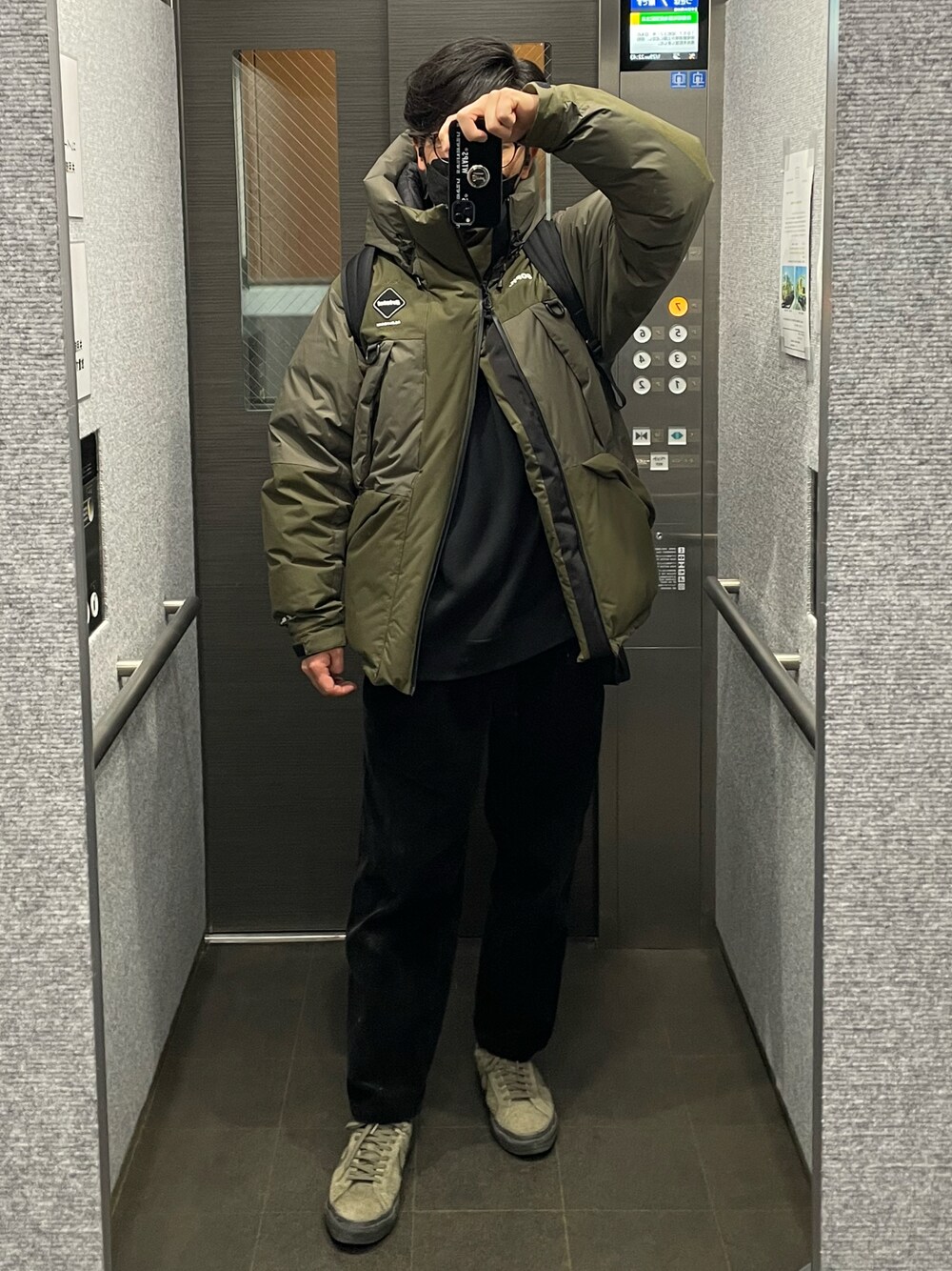「F.C.Real Bristolのアイテム（ダウンジャケット/コート、グリーン系）」を使った、TAKROCKさん（メンズ・173cm）の冬コーディネートの1枚目の写真