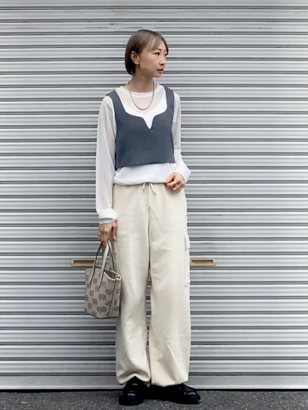 MICHAEL KORS（マイケルコース）の「KIMBER 2 IN 1 ジップ