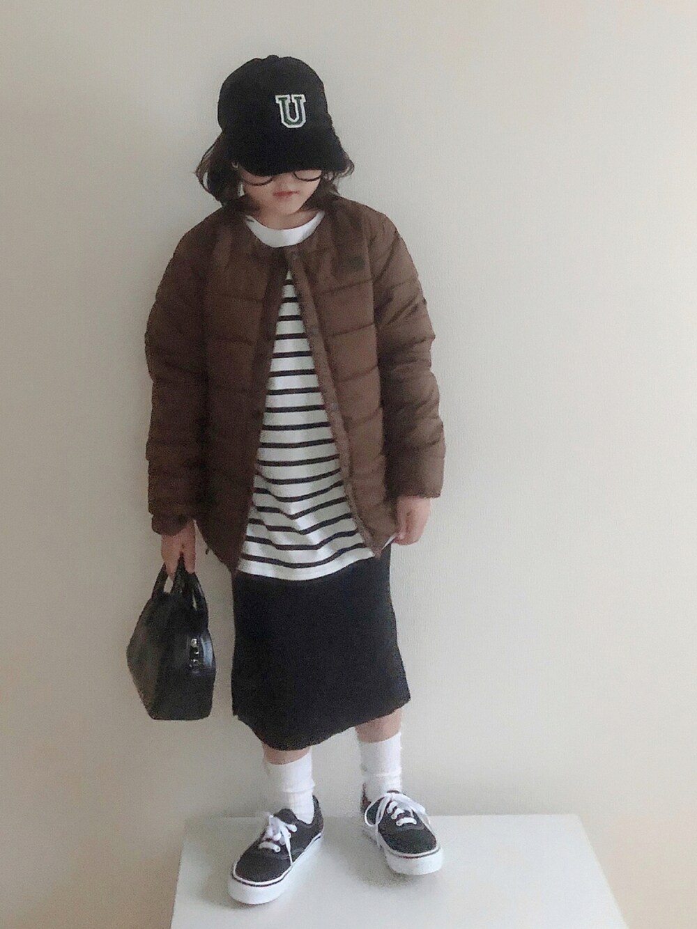 「スカート、キッズコーデ、タイトスカート、ボーダー、キャップ、ミニバッグ、ボストンバッグ、VANS」｜「THE NORTH FACEのNYJ82131/MICRO ZEPHER CD（その他アウター、ブラウン系）」を使った、nami *さん（キッズ・110cm）の秋コーディネートの1枚目の写真