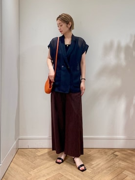 オレンジ系のアイテムを使った「ストライプパンツ」のレディース人気