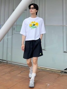 「NEW BALANCE（ニューバランス）のキャッスルフィールドウーブンショーツ7インチ（その他パンツ、ブラック系）」を使った、New Balanceさん（レディース・150cm）の夏コーディネート