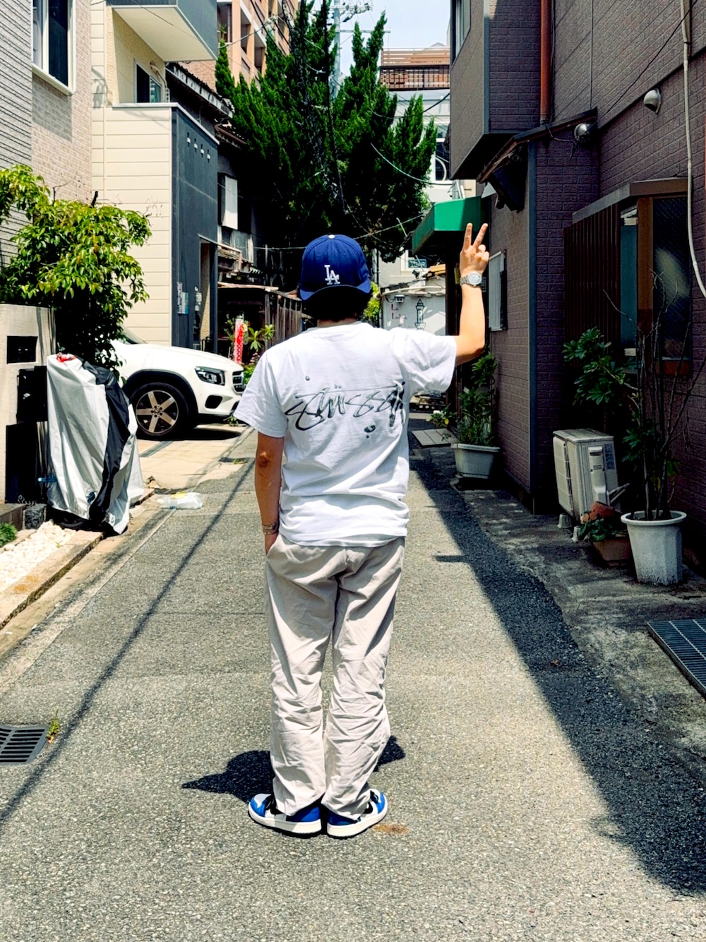 「アメカジ、ストリート、古着MIX、古着、古着コーデ」｜「STUSSYのアイテム（Tシャツ/カットソー、ホワイト系）」を使った、たつやさん（メンズ・155cm）の春コーディネートの1枚目の写真