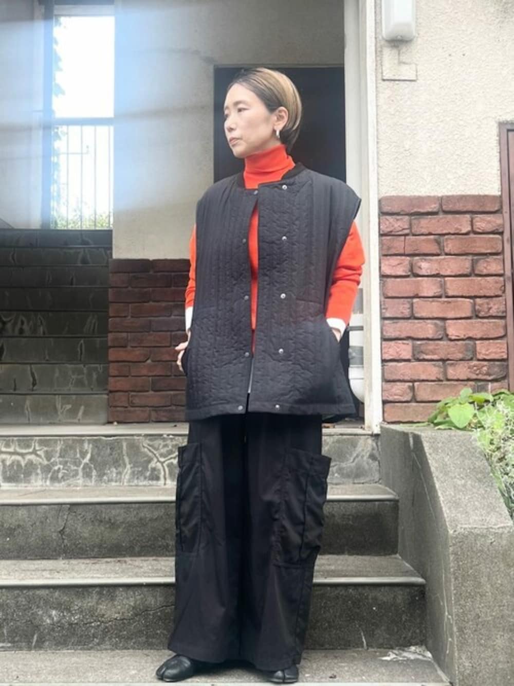 yuni（ユニ ）の「○タイプライター エボダウンベスト