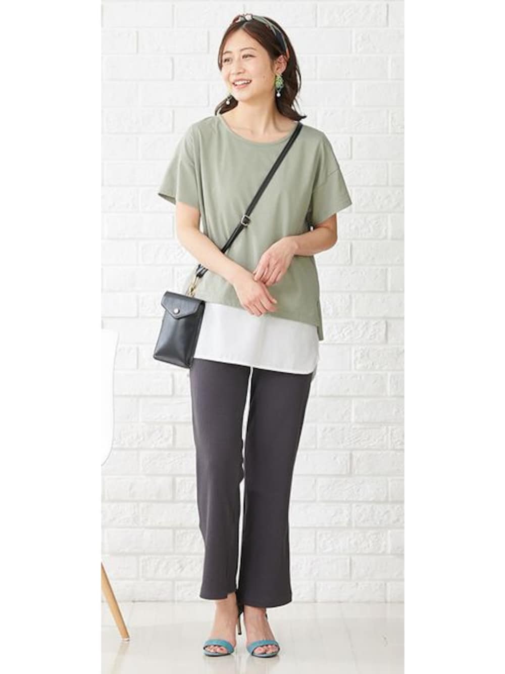 ブラック系のマタニティウェア/グッズ、グリーン系のマタニティウェア/グッズを着用したレディースの春コーディネートの1枚目の写真