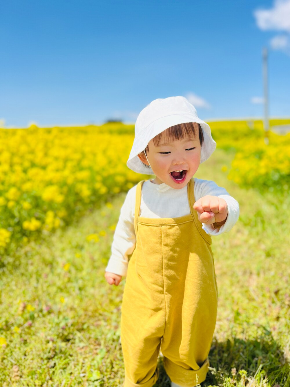 「キッズファッション、男の子、韓国ファッション、2歳、ロンパース、プチプラ、セットアップ、おしゃれさんと繋がりたい、菜の花畑」｜「オーガニックズーのアイテム（ママ＆ベビー、イエロー系）」を使った、chulipo2さん（キッズ・80cm）の春コーディネートの1枚目の写真