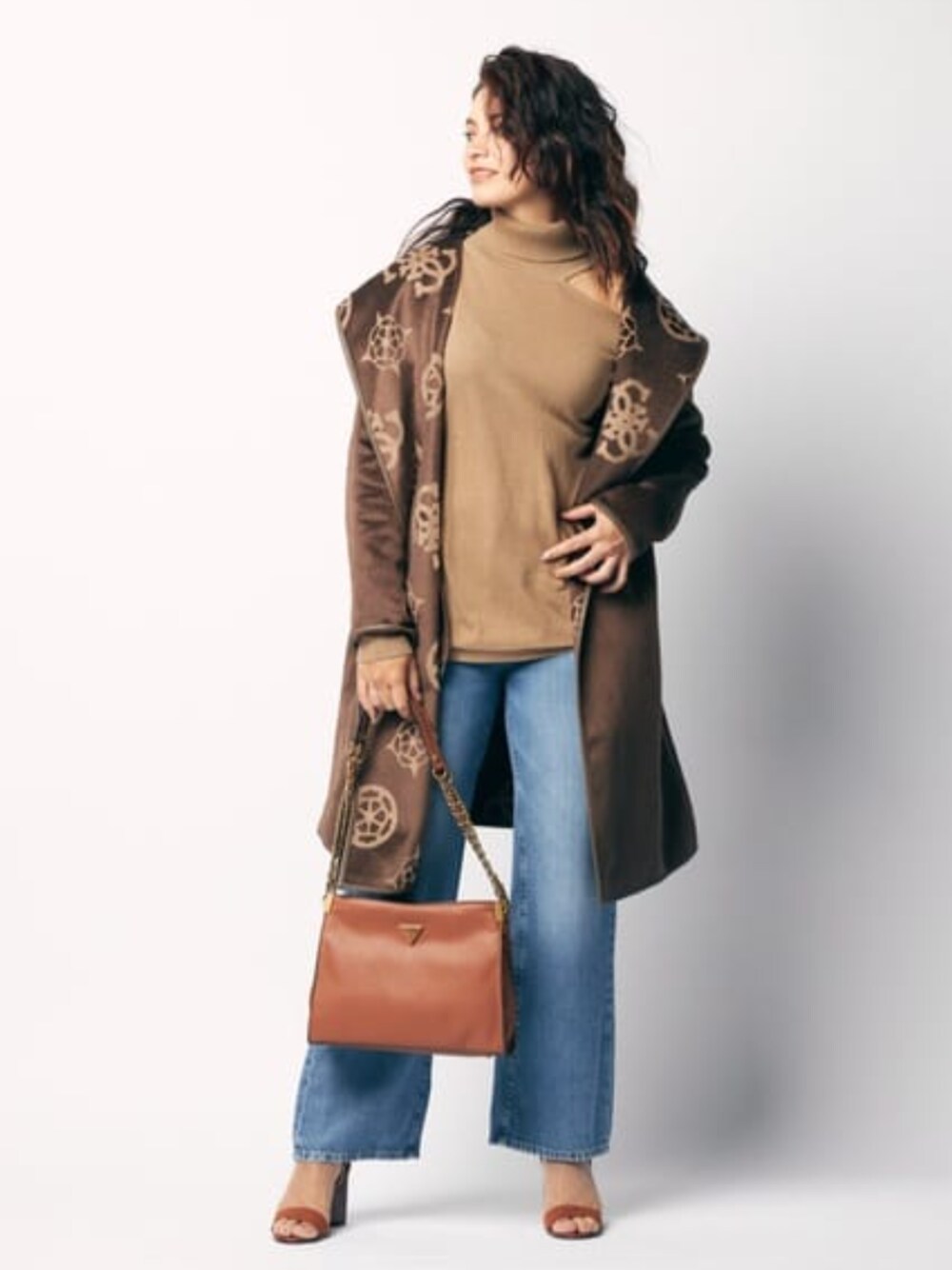 Guess（ゲス）の「Eve Cutout Shoulder Sweater（ニット