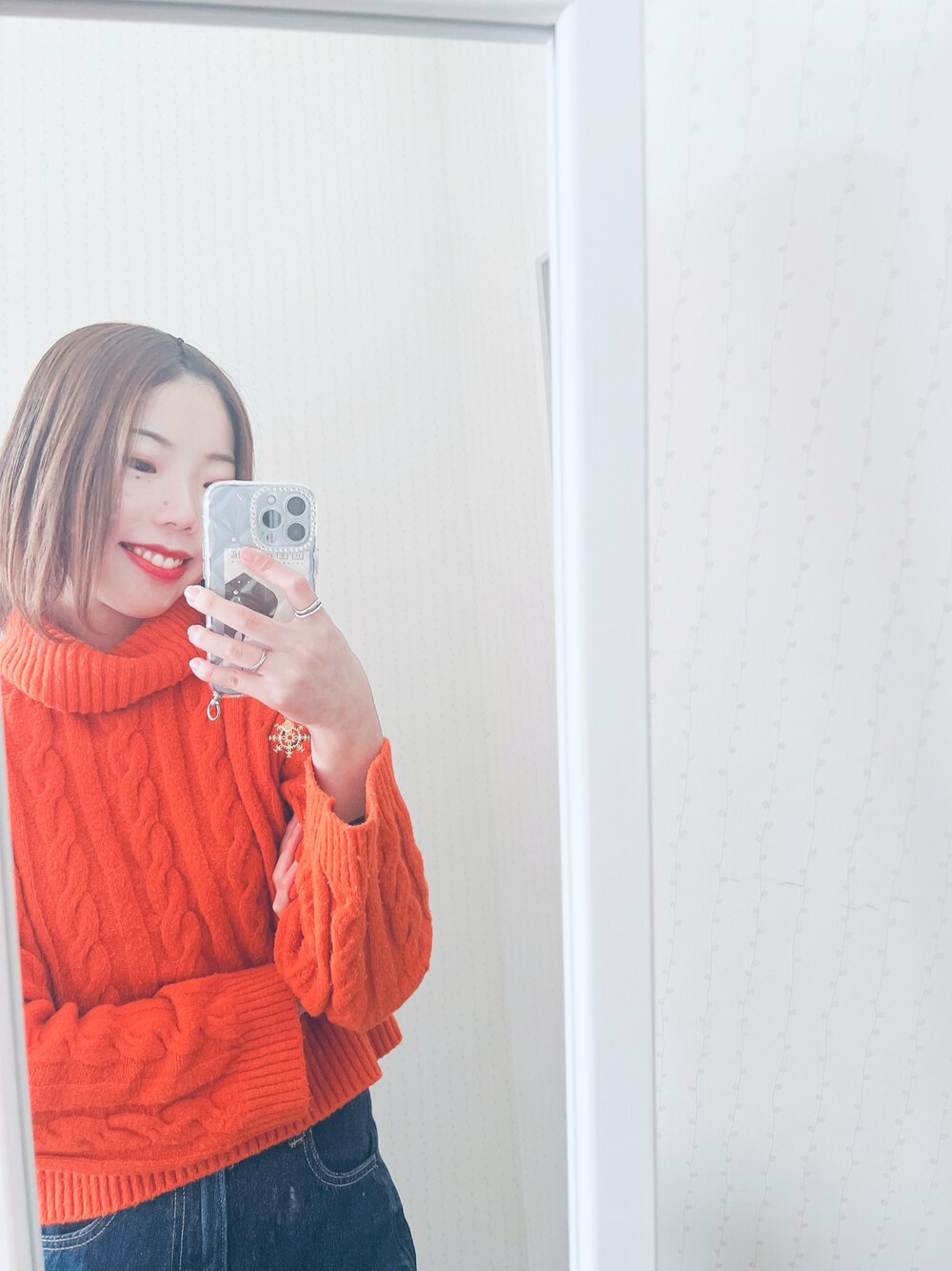 「プチプラ、休日スタイル、冬のコーデ、GU、カラーコーデ、冬服コーデ、オレンジニット、オレンジ」｜「GUのアイテム（ニット/セーター、オレンジ系）」を使った、石川ひかるさん（骨格ウェーブ・レディース・160cm）の冬コーディネートの1枚目の写真