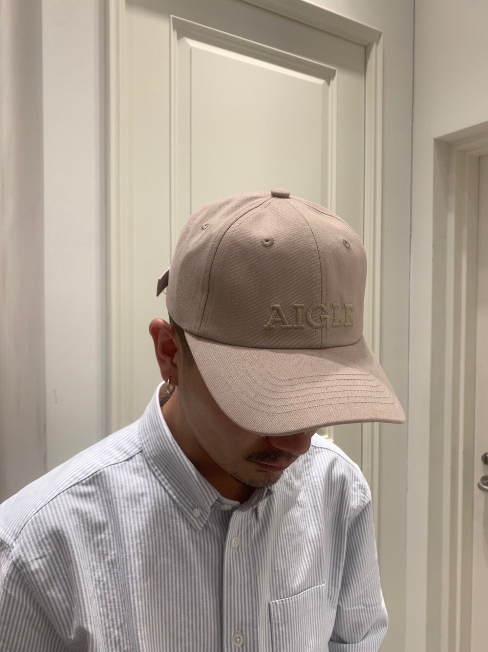 「ステンカラーコート、ローファー、ストライプ、きれいめカジュアル、春コーデ、oxford、AIGLE、バルマカーンコート」｜「AIGLEの透湿防水 コットンタッチ ヘリテージステンカラーコート（ステンカラーコート、グリーン系）」を使った、Hajimeさん（メンズ・171cm）の春コーディネートの5枚目の写真