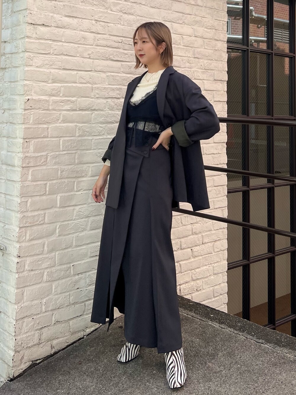 「PUBLIC TOKYOのウーリートラペーズスカート（スカート、グレー系）」を使った、福田優花さん（レディース・163cm）の秋コーディネートの1枚目の写真
