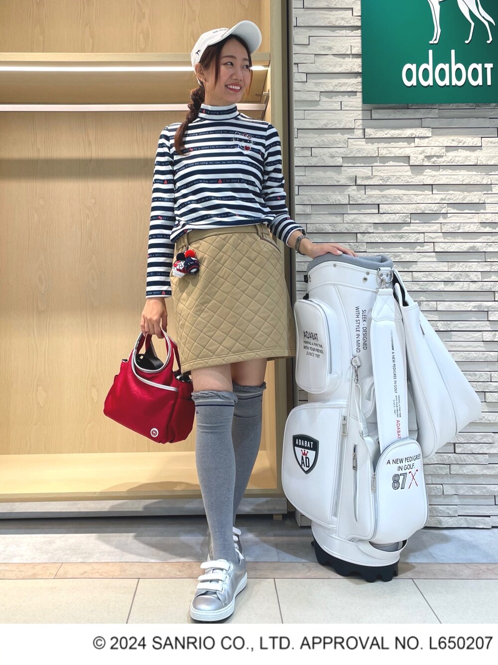 「アダバット、adabat、ゴルフウェア、ゴルフ、スポーツ、ハローキティ」｜「adabatの【撥水加工／防風】キルト素材 ウエストゴムスカート（スカート、イエロー系）」を使った、Hさん（レディース・160cm）の秋コーディネートの1枚目の写真