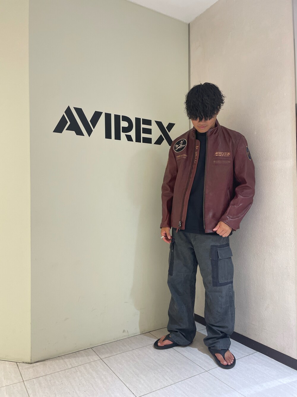 ライダースジャケット（レッド系）を使った「ビッグシルエット」の