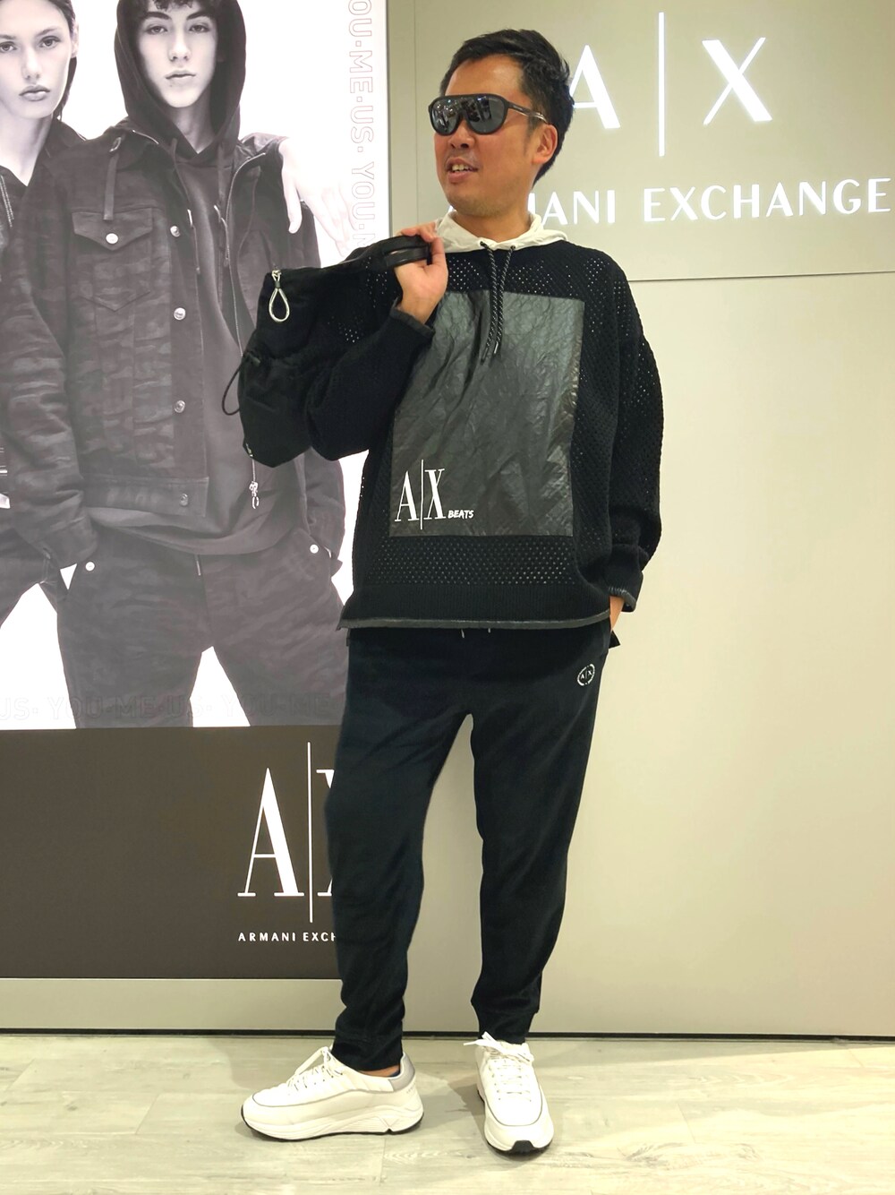 「AXchange、AXchanger、アルマーニエクスチェンジ、アルマーニ、春夏コーデ、スニーカー、40代ファッション、目指せイケオジ、カジュアル、ジム、映画」｜「ARMANI EXCHANGEの【A|X アルマーニ エクスチェンジ】AX BEATS オーバーサイズメッシュスウェット（スウェット、ブラック系）」を使った、TAKANOさん（メンズ・175cm）の春コーディネートの1枚目の写真