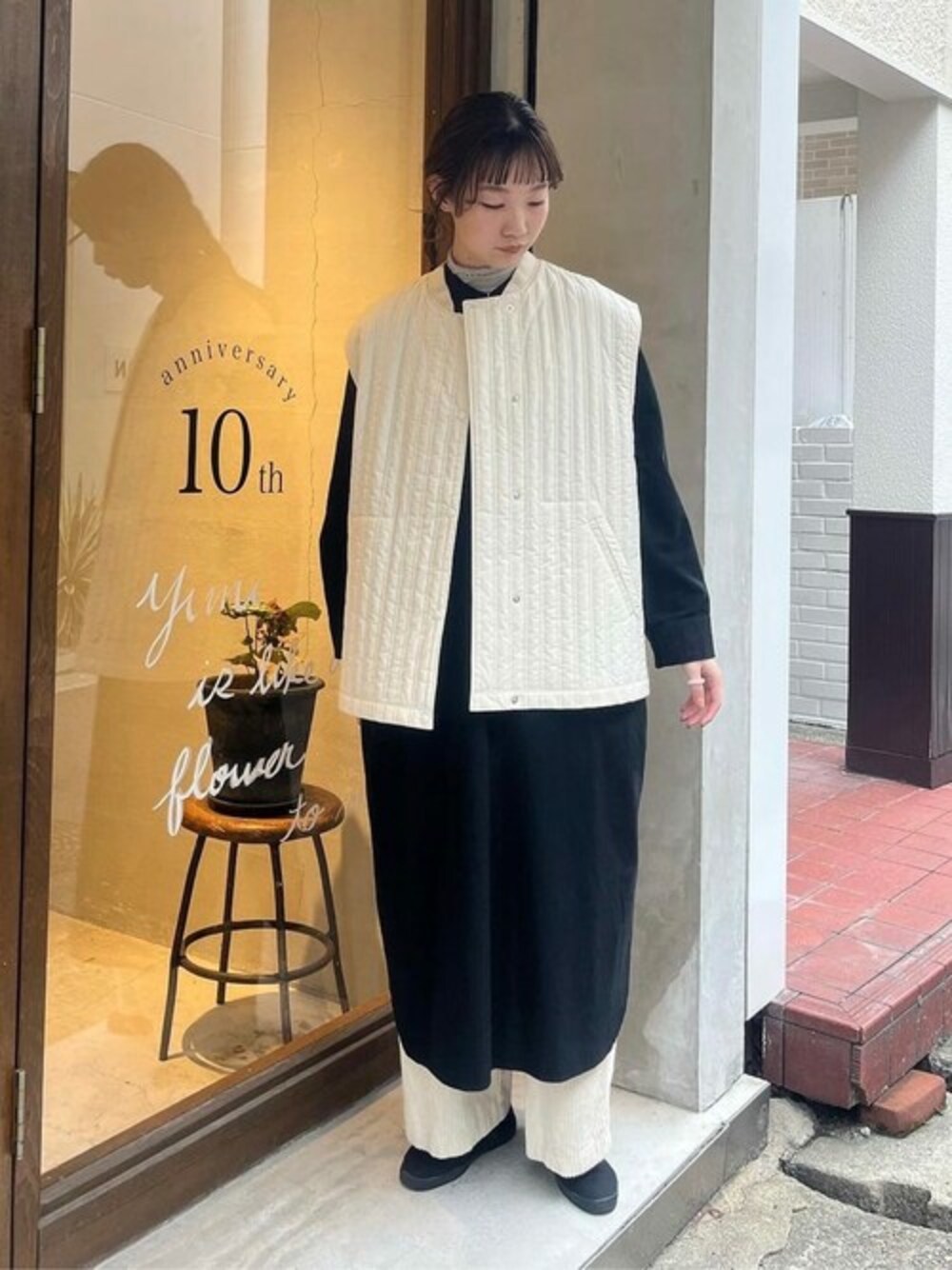 yuni（ユニ ）の「○タイプライター エボダウンベスト