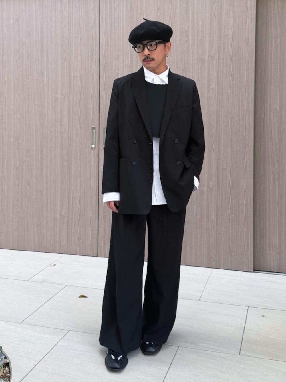 BLACK COMME des GARCONSのベストを使った人気ファッション