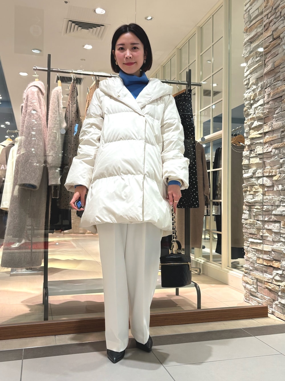 撥水ダウンショール風フードコートを使った人気ファッション