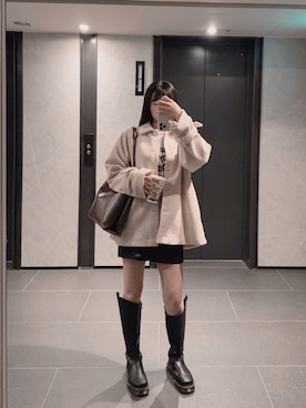 「Dr. Martens（ドクターマーチン）のアイテム（シューズ、ブラック系）」を使った、Hannahさん（レディース・168cm）の冬コーディネート