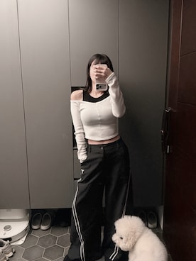 「NIKE（ナイキ）のアイテム（パンツ、ブラック系）」を使った、Hannahさん（レディース・168cm）の冬コーディネート