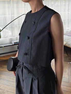「RIM.ARK（リムアーク）のDrum leather clutch bag ドラムレザークラッチバッグ（クラッチバッグ、ブラック系）」を使った、RIM.ARK staffさん（レディース・170cm）の春コーディネート