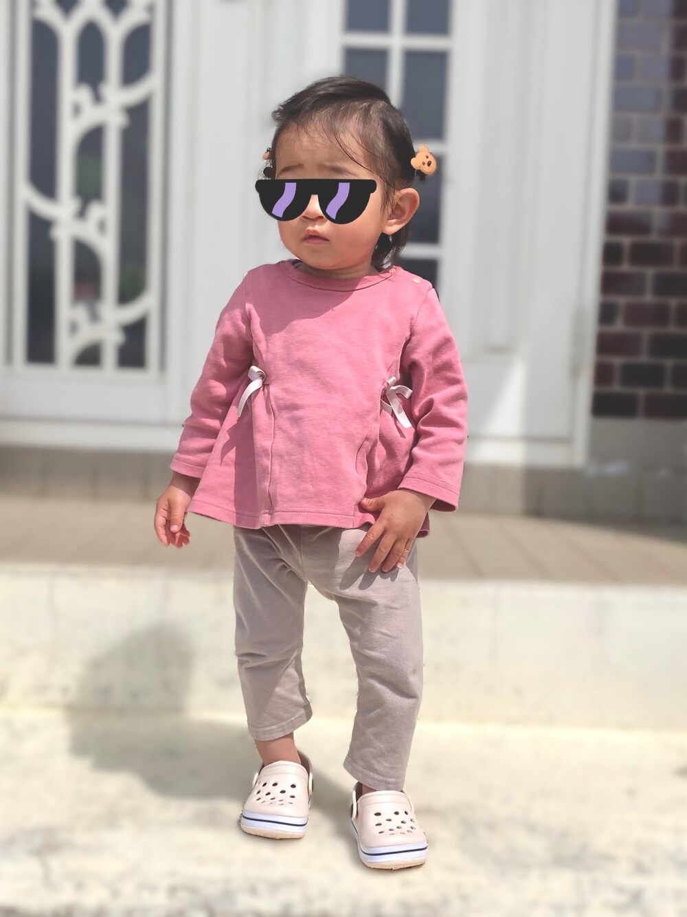 「キッズファッション、プチプラコーデ、ピンク、くまさん、春コーデ、1歳、1歳3ヶ月、プティマイン」｜「petit mainの【オーガニック】ウエストリボンTシャツ（Tシャツ/カットソー、ピンク系）」を使った、Raviさん（キッズ・80cm）の春コーディネートの1枚目の写真