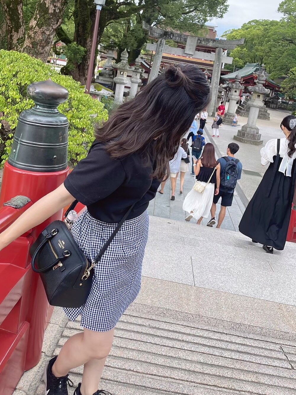 COACHのボストンバッグを使ったレディース人気ファッション 