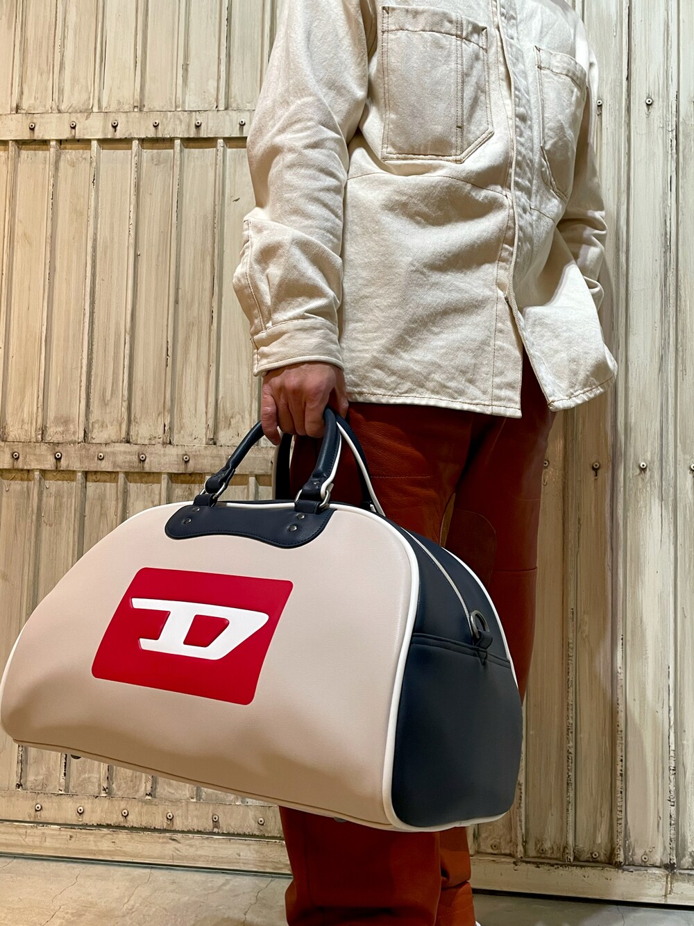 DIESEL（ディーゼル）の「ユニセックス Dロゴ カラーブロック トラベル