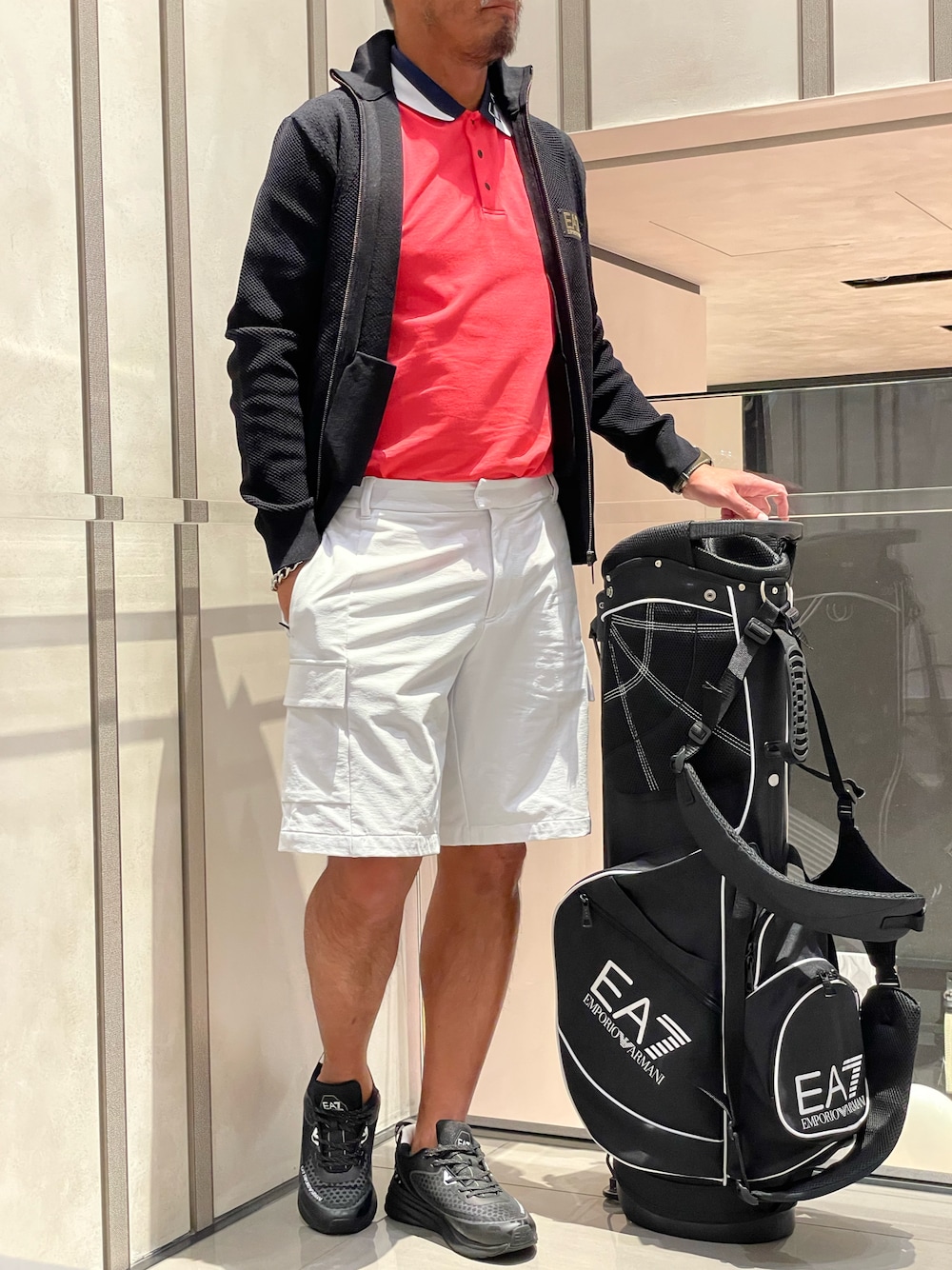 「EMPORIO ARMANI、EMPORIO ARMANI EA7、ゴルフ、ゴルフウェアメンズ、ゴルフ男子、ゴルフコーデ」｜「EMPORIO ARMANI EA7のアイテム（ポロシャツ、レッド系）」を使った、しんちゃんさん（メンズ・175cm）の春コーディネートの1枚目の写真